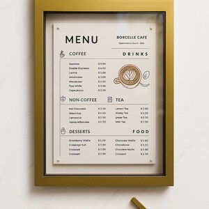 Magnetic menu box used in a café setting with printed menu sheet inside