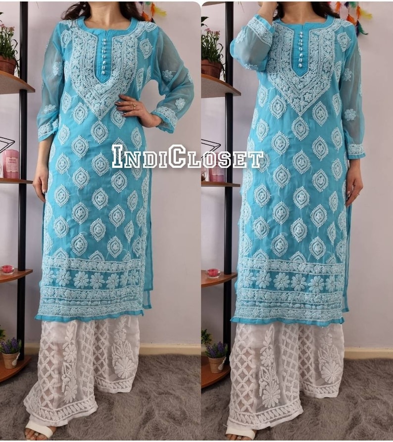 May include: A turquoise blue long-sleeved kurta with white embroidery and a white palazzo pant. The kurta has a round neckline and a button closure. The palazzo pant has a lace trim.