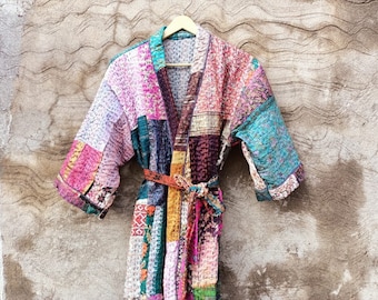 May include: A colorful patchwork robe with a tie belt. The robe is made of a soft, quilted fabric and has a traditional Japanese kimono style.