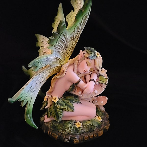 Green Fairy Figurine Sleeping with Mushroom