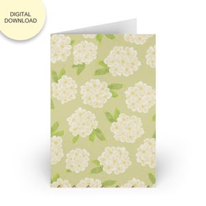 May include: A folded greeting card with a pattern of white flower clusters and green leaves on a light green background. The words "DIGITAL DOWNLOAD" are in a yellow circle in the upper left corner.