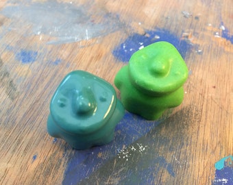 set of two small original figurines in green resin of the character GLUMO