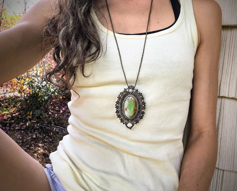 Oval Victorian Era Style Macrame Necklace Design with Peruvian SerpentinePetrified Wood Mix and Crystal Quartz and Brass Beads Very Unique