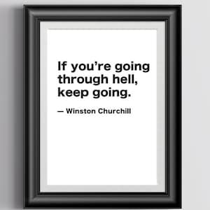 May include: A framed print with a black frame and a white background. The print features the quote "If you're going through hell, keep going." by Winston Churchill in black text. The frame is rectangular and hangs on a white wall.