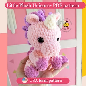May include: A pink and purple plush unicorn crochet pattern. The pattern is written in US terms. The pattern is available as a PDF download.