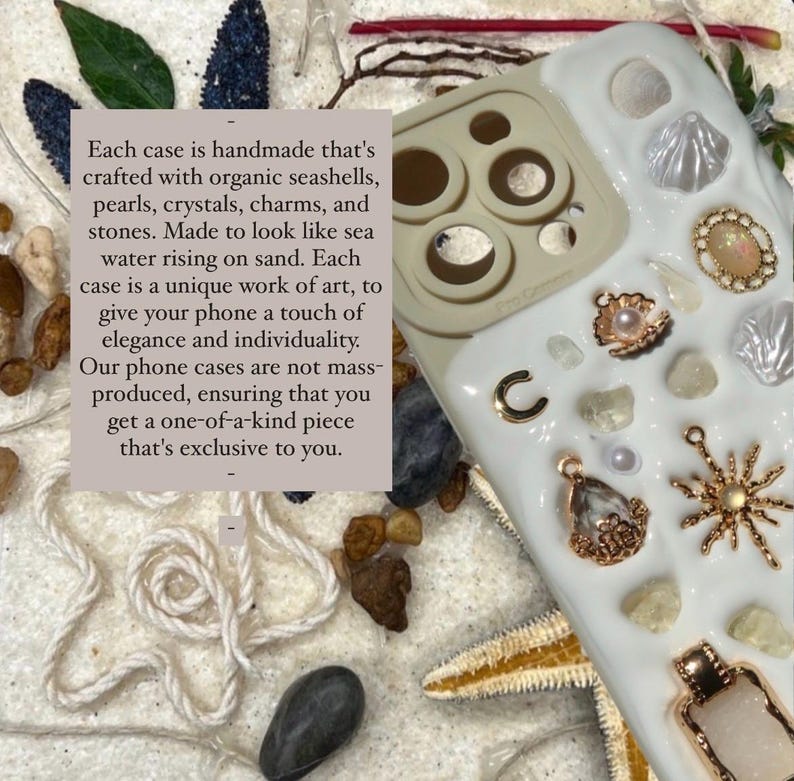 May include: A white phone case decorated with seashells, pearls, crystals, and charms. The case is handmade and has a unique design that looks like sea water rising on sand. Each case is a unique work of art, to give your phone a touch of elegance and individuality. Our phone cases are not mass-produced, ensuring that you get a one-of-a-kind piece that's exclusive to you.