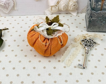 Small decorative cloth pumpkin, orange