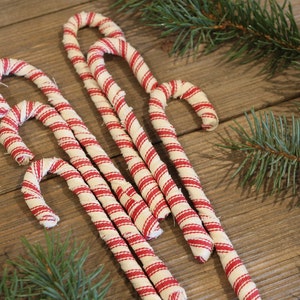 NEW dead Stock Vintage Rubber Christmas Magnet Crossed Candycanes Red White 