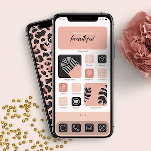 May include: A pink and black iPhone home screen with a leopard print background and custom app icons. The text "CREATE SOMETHING beautiful" is at the top of the screen.