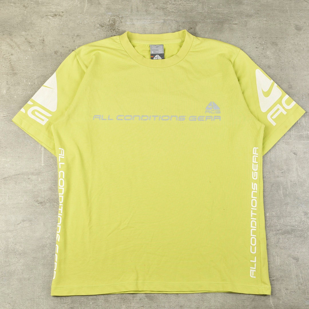 nike acg yellow t shirt