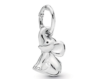 May include: A silver elephant charm with a loop for a bracelet or necklace. The charm is detailed with a trunk, ears, and a small black eye. The elephant is in a sitting position.