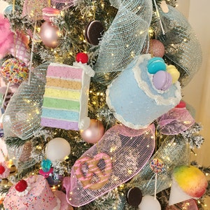 Candy Christmas tree kit.Candy land decor,Candy Christmas ornaments,bow and ribbon. Fake candy, cakes. New ornaments added.So fun and unique