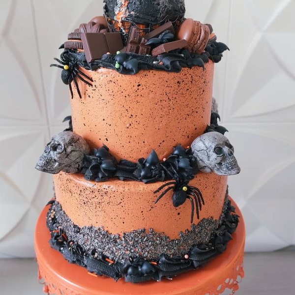Fake Halloween display cake with skulls and spiders