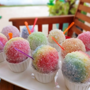 Fake hyper realistic snow cones. Set of 2 (your choice of colors) Perfect for all year round display!