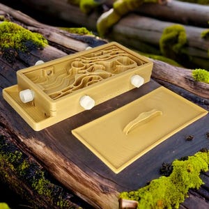May include: A beige plastic ant farm with a removable lid. The ant farm has a maze-like design with multiple chambers and tunnels. The lid has a small handle.