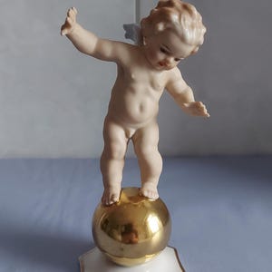 Hutschenreuther-~Porcelain Figurine-~Putto at the Golden Ball-~Design: K.Tutter-~