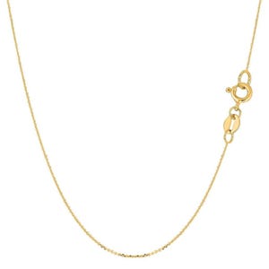 May include: A delicate gold-colored necklace with a lobster clasp. The chain has a subtle, textured pattern. The necklace is shown against a white background, highlighting its simple elegance. A classic piece of jewelry.