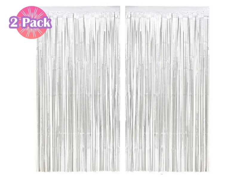 May include: Two silver foil fringe curtains, each measuring approximately 3 feet wide by 8 feet long. The curtains are made of thin strips of foil that hang down from a horizontal rod. The curtains are often used as a backdrop for parties or events.