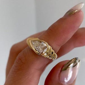 Art Deco Pear Moissanite Engagement Ring: 14k Yellow Gold Bezel Set