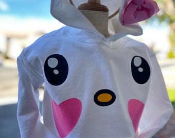 Sudadera con capucha para niñas inspirada en Hello Kitty. (Amiga con rollo de canela).