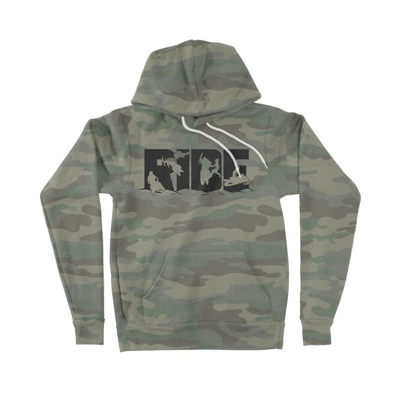 May include: A camouflage green hoodie with a black graphic of people riding snowmobiles and the word "RIDE" in large letters.