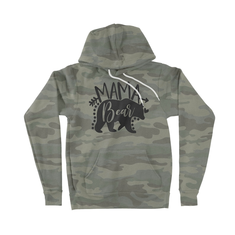 May include: A green camouflage hoodie with a black silhouette of a bear and the text "Mama Bear" with arrows on either side.