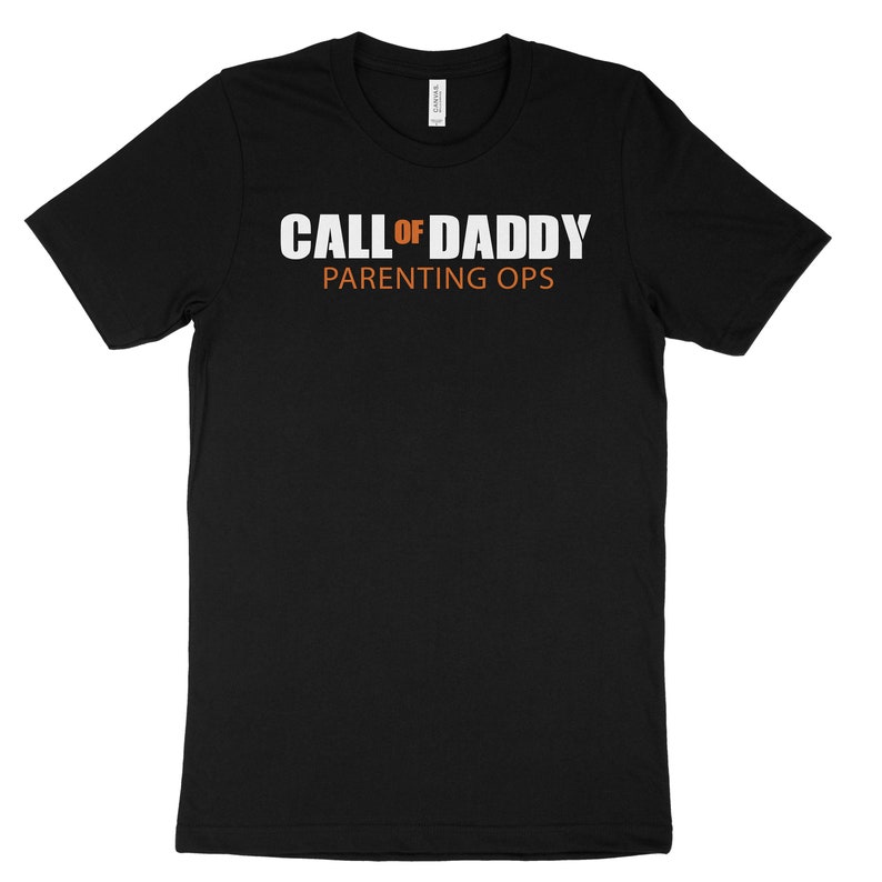 May include: Black t-shirt with white text that reads "CALL OF DADDY PARENTING OPS".