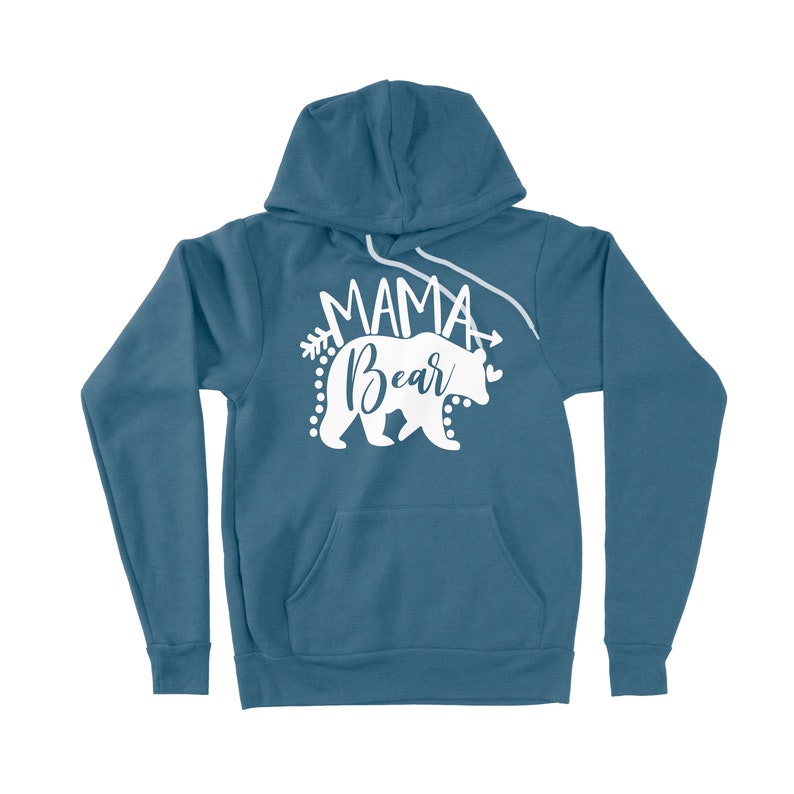 May include: A blue hooded sweatshirt with a white graphic of a bear and the text "Mama Bear" with arrows and hearts.