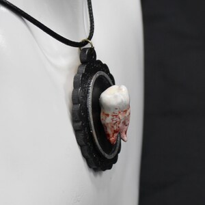 Black Wood Pendant with Human Tooth