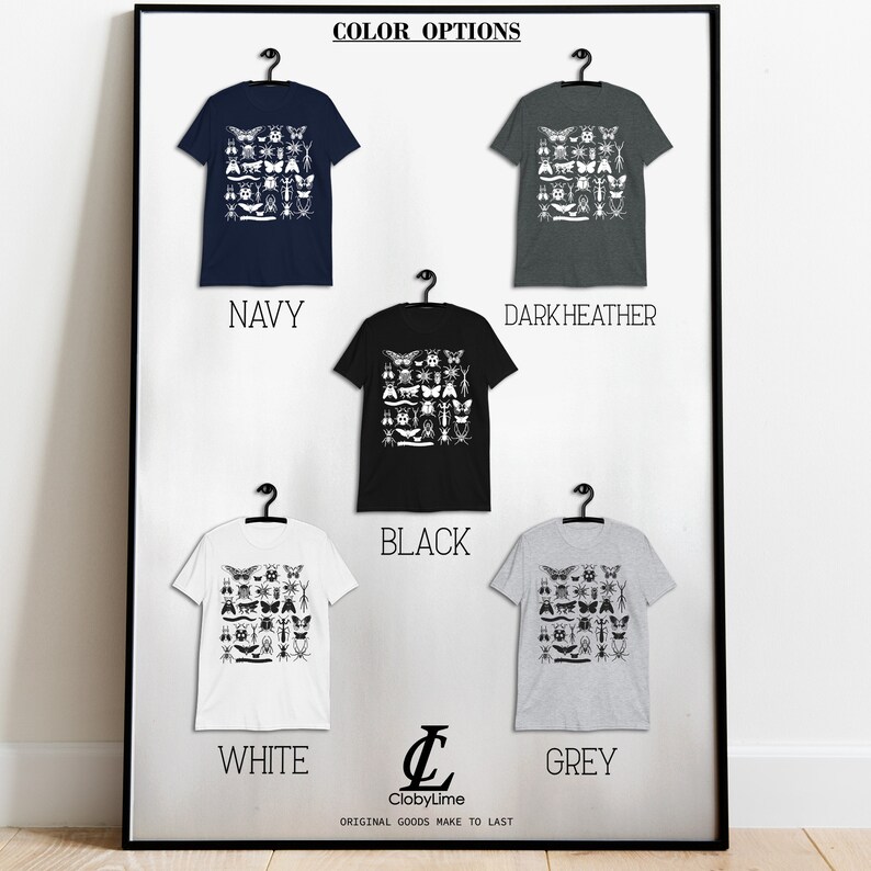 May include: Five t-shirts displayed on hangers, showing different color options: navy, dark heather, black, white, and grey. Each t-shirt features a white graphic print of various insects and butterflies.