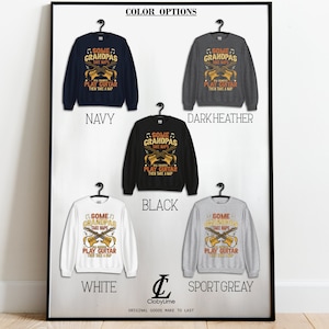 May include: A display of sweatshirts in navy, dark heather, black, white, and sport grey. Each sweatshirt features a guitar graphic and the text "SOME GRANDPAS TAKE NAPS, REAL GRANDPAS PLAY GUITAR THEN TAKE A NAP."