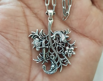 Cimaruta-bedelketting, Italiaanse volksmagie, hekserijspreuk Zonnekruis, bezem, raaf, hart, halve maan, amulet talisman en ketting