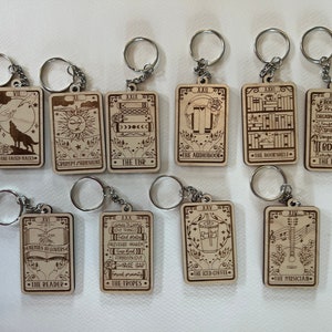 You choose wooden tarot bookish booktok keychains There are a ton of options to choose from You can personalize the back image 1