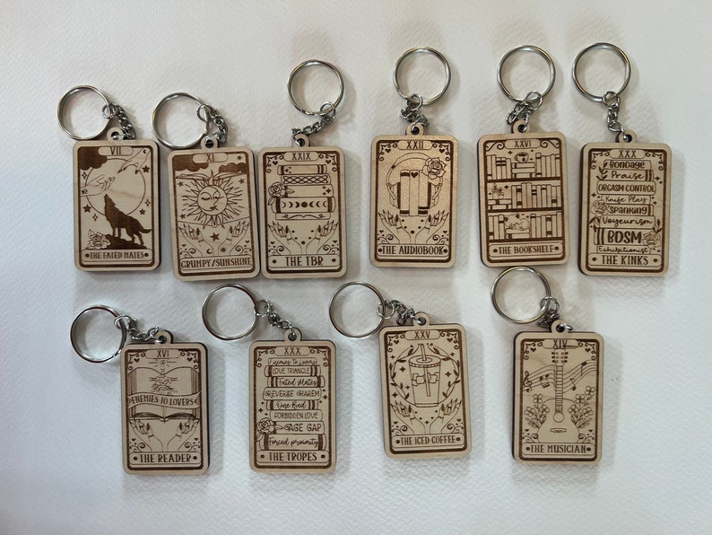 You choose wooden tarot bookish booktok keychains There are a ton of options to choose from You can personalize the back image 1