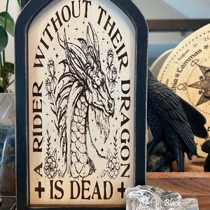 Officially licensed Fourth Wing A rider without their dragon wooden decor wall art.