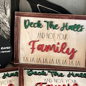 Deck the halls and not your family fa la la 8x6 wooden sign.