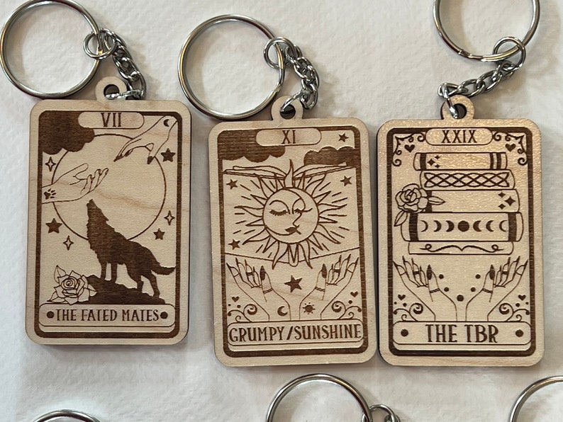 You choose wooden tarot bookish booktok keychains There are a ton of options to choose from You can personalize the back image 5