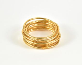 Bracciale buddista in oro chiaro
