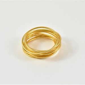 Fine light gold Buddhist bangle image 1