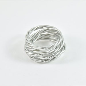 Silver twisted Buddhist bangle image 1