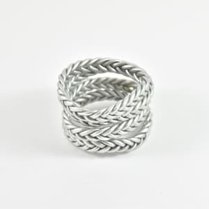 Bracciale buddista intrecciato in argento