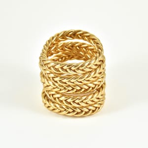 Bracciale buddista intrecciato in oro chiaro