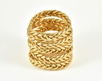 Bracciale buddista intrecciato in oro chiaro