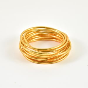 Bracciale buddista in oro fino