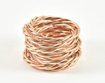 Twisted champagne Buddhist bangle