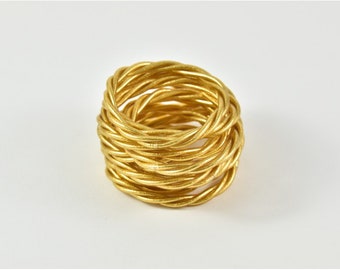 Light gold twisted Buddhist bangle