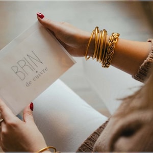 Fine light gold Buddhist bangle image 3