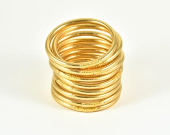 Brazalete grueso de mantra budista de oro claro