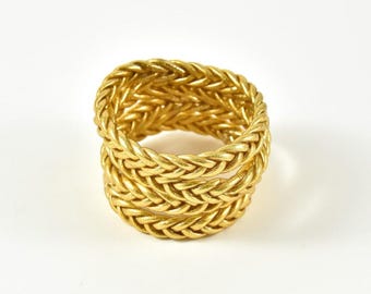 Lichtgouden gevlochten boeddhistische armband