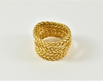 Brazalete budista trenzado en oro claro